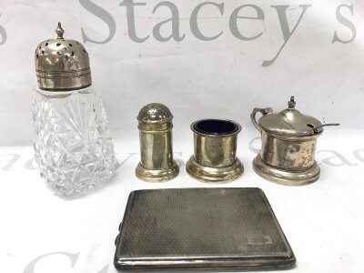 A mixed lot hallmarked silver including a cigarette case, cut glass shaker