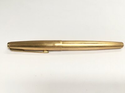 A Parker fountain pen with a 14k gold nib.