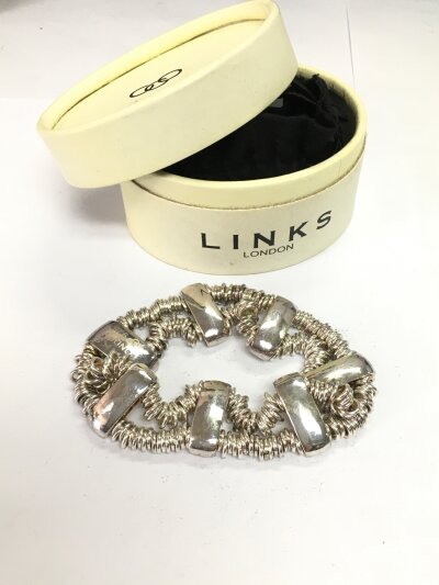 A boxed Links of London bracelet.