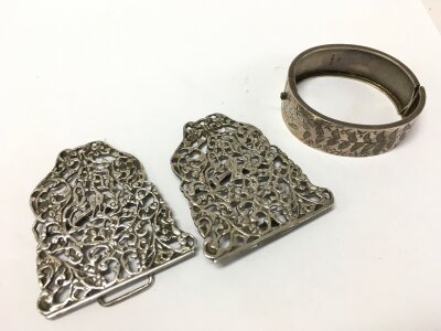Hallmarked silver bracelet approx 5.5cm inner width, 24.1 grams , maker Arthur Hamill Westwood , Birmingham. And hallmarked belt buckle 67.4g , 14cm long, maker Charles Boyton & Son London c.1896s