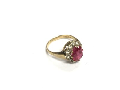 A 9ct gold ruby and diamond ring, approx 2.7g and approx size J.