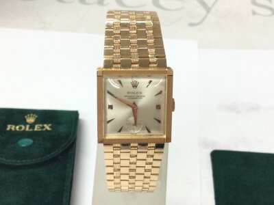 A vintage Rolex Chronometer reference 9347 with square case. Silver dial with sub seconds dial at 6 o’clock. Integrated bracelet is the brick link. Manual wind movement which winds and runs. No box or paperwork.
Case is 26mm excluding crown. In very clean condition. Circa 1950s