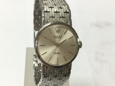 A vintage Rolex Geneve Cellini ref 3619 watch featuring an 18ct white gold case and a matching integrated white gold mesh bracelet.