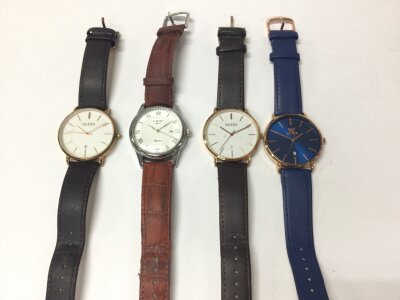 Four modern quartz watch’s.