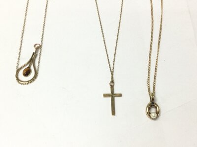Two 9ct gold chain with 9ct pendants and one gold tone chain and pendant.