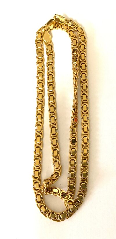 A heavy 9ct yellow gold Byzantine design chain necklace, 52cm overall length.