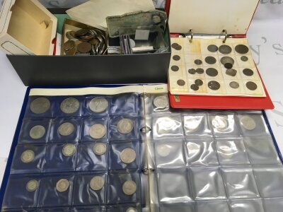 A mixed collection of British and World coinage and bank notes.