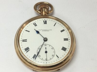 Thos Russell and son gold plated pocket watch. Winds and runs. 50mm case.