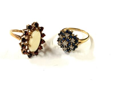 2 9ct gold dress rings. 1 x opal and garnet cluster /. 1 X Sapphire and diamond cluster.