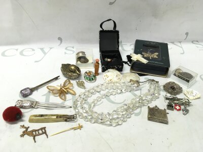 A collection of costume jewellery and silver items