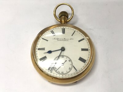 An 18ct gold button wind pocket watch. 83.80g not running.