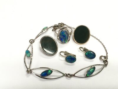 A collection of silver jewellery set with opal doublets, two opal clip on earrings, one marked 585.