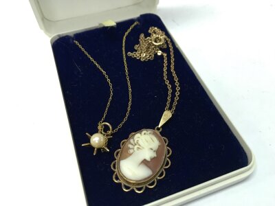 Two pendants and chains, 5.8g total weight.Pearl and brooch design