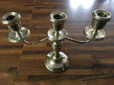A silver Birmingham hallmarked candelabra. Approximately 20cm in height and 25cm wide