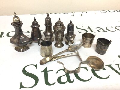 A Collection of five silver condiments silver spoons a pair of miniature silver plated buckets and a small Egyptian white metal vase