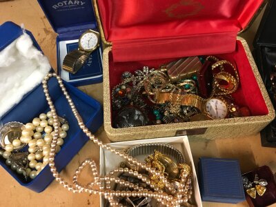 A small collection of costume jewellery and dresses watches.
