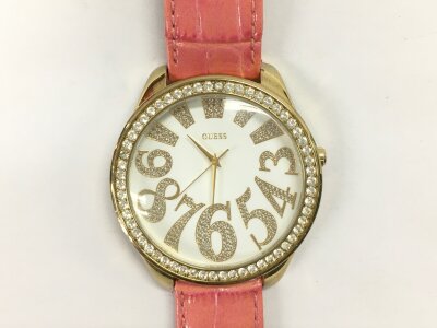 A large Guess designer watch.