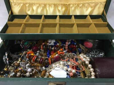 A large box of costume jewellery including necklaces, bracelets, earrings