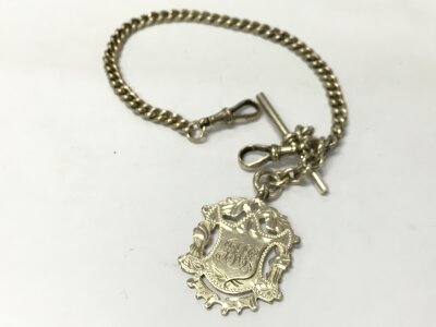 A silver albert with medallion, 1900 . Total weight 32.2g