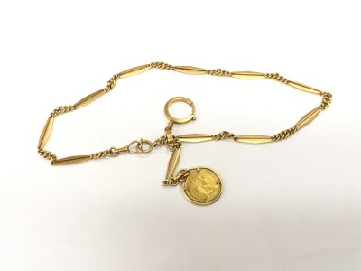 An 18ct gold watch chain with attached Austrian Ducat coin, approx 47.7g.