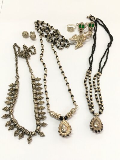 Indian jewellery including three necklaces, earrings, rings, brooch