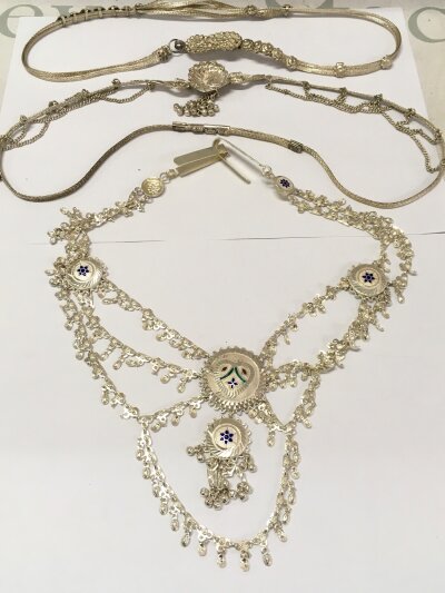 Three Indian silver belts. 27 to 32cm wide