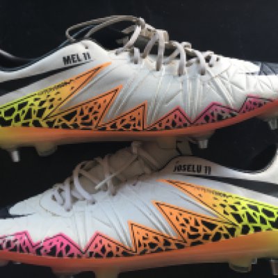 Joselu Stoke Newcastle Spain Match Worn Football Boots: Nike Hypervenom pair of boots with Joselu 11 to one boot and Mel 11 ( reference to his wife) to the other. Worn during his time at Stoke City where he wore number 11.