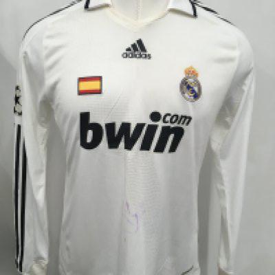 2008 - 2009 Real Madrid Salgado Match Issued Football Shirt; White long sleeve with Champions League badging to one sleeve and Champions League Cup 9 to other sleeve with refers to previous cup wins. Spain badge to breast only used in Champions League matches. Issued for match v Liverpool. Number 2 M Salgado to rear. Autograph blurred as been washed. Salgado did not make the squad for both matches.