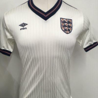 England 1984 Match Worn Football Shirt: White short sleeve Umbro shirt with number 12 to rear. Worn by Tottenham player Gary Stevens v Turkey when he came on a second half substitute.