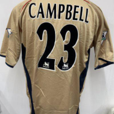 Arsenal 2001 - 2002 Match Worn Sega Football Shirt: Short sleeve gold away kit with Premier League badging to sleeve. Campbell number 23 to rear. Sega sponsor. Signed COA stating I wore this shirt v Middlesbrough on August 18th 2001.