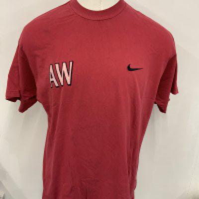 Arsene Wenger Arsenal Training Kit: The managers red shorts and short sleeve matching top. C/W beige heavy long sleeve sweat shirt. Each item has the initials AW. Signed COA stating this was my training kit when we finished 2nd in the Premier League and FA Cup. (3)