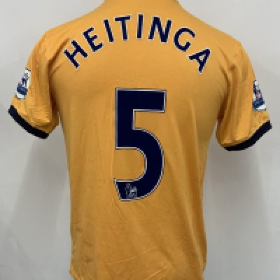 Heitinga Everton 2011 - 2012 Match Worn Football Shirt: Gold short sleeve with Heitinga number 5 to rear. Premier League badging to sleeves. Swapped with Bobby Zamora. Unwashed.