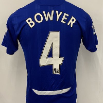 Bowyer Birmingham City 2009 - 2010 Match Worn Football Shirt: Blue short sleeve with Bowyer number 4 to rear. Premier League badging to sleeves. Swapped with Bobby Zamora. Unwashed. Badge to left sleeve coming away slightly.