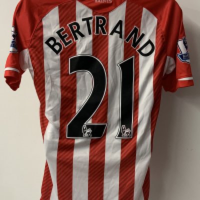 Bertrand 2014 - 2015 Match Worn Football Shirt: Red White short sleeve with Bertrand number 21 to rear. Premier League badging to sleeves. Swapped with Bobby Zamora. Unwashed.