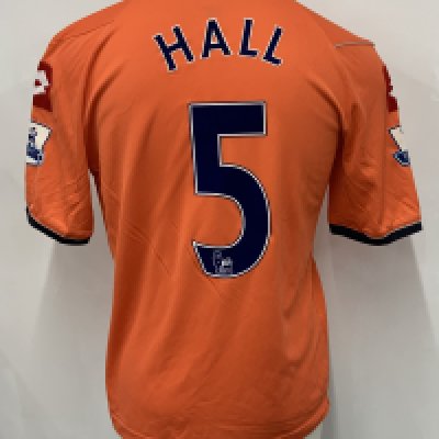 QPR 2011 - 2012 Match Worn Football Shirt: Orange short sleeve with Hall number 5 to rear. Premier League badging to sleeves. Swapped with Bobby Zamora. Unwashed.