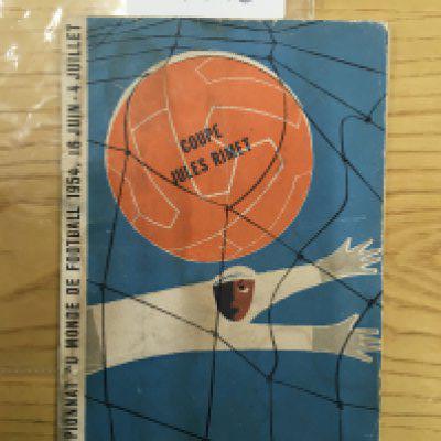 1954 World Cup Semi Final Football Programme: Uruguay v Hungary which has some staining and small piece of tape to lower spine. Writing to team page.