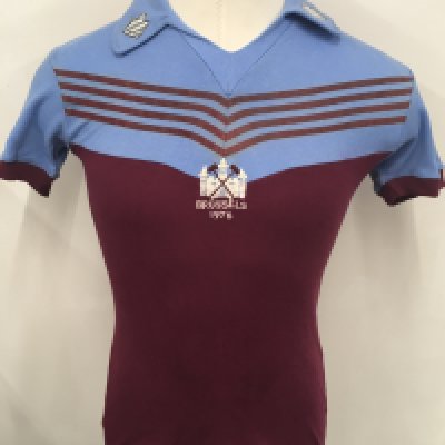 West Ham 1976 ECWC Final Match Worn Football Shirt: Admiral claret and blue shirt worn once in the European Cup Winners Cup final in Brussels v Anderlecht. The word Brussels in centre of the shirt under West Ham embroidered club badge. Admiral logo to both collars. Excellent condition number 6 shirt worn by John McDowell.