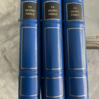 FA Trophy Complete Football Programme Collection: Housed in three expensive blue binders stating FA Trophy Finals to spine. Complete run from 1970 - 2015 a run of 46 consecutive finals plus 3 replays and 9 brochures. Excellent.