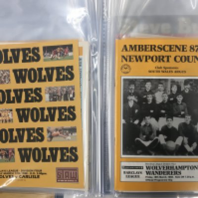 Wolves 87/88 Championship Season Complete Set: Home and away programmes from the Division 4 championship season. Includes Sherpa Van and a signed Steve Bull testimonial. 66 programmes in 2 folders with instructions to sell. Excellent.
