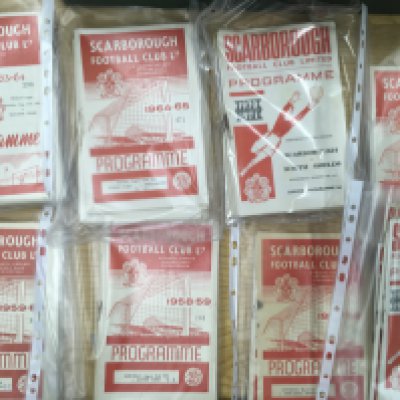 Scarborough Home + Away Football Programmes: There is a packet for each season 57/58 to 79/80 then 43 binders from 80/81 to 2013. Please note vendor has kept 3 seasons 86/87 87/88 + 98/99 but others binders look complete. Includes friendlies, minor cups etc. Worth viewing. (7 boxes)