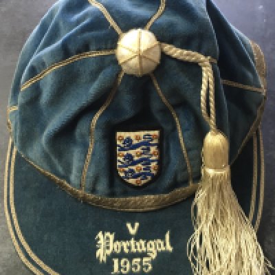 Frank Blunstone Chelsea Footballer England 1955 International Cap: Full International blue cap with 3 Lions to front and tassel. Peak reads 1955 Portugal. This match in Portugal was only days after he was crowned a 1st Division championship winner with Chelsea. Very good.
