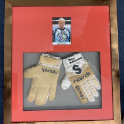 Peter Schmeichel Aston Villa Match Worn Goalkeeper Gloves: Pair of Reusch gloves with Peter Schmeichel printed to band. Framed with a signed picture of Peter in Aston Villa kit. Not for posting.