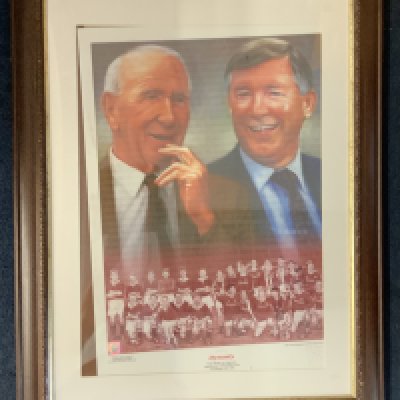 Busby + Ferguson Manchester United Football Print: Sought after limited edition print number 79/500. Named Dynasty published in 2001. Slipped in frame so will need readjusting. Signed by the artist. Not for posting.