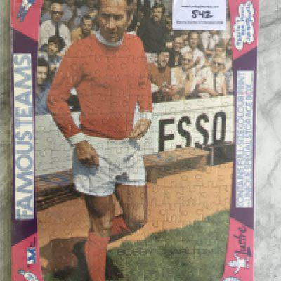 Bobby Charlton Manchester United + England Jigsaw Puzzle: Still sealed and in packaging featuring Bobby in Manchester United kit made in the 70s by Lustre. 250 pieces. Rare poster to rear as guide for making up.