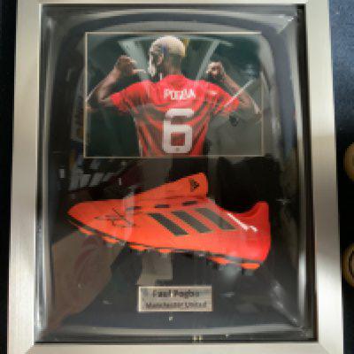 Paul Pogba Signed Framed Manchester United Football Boot: An Adidas orange unused boot signed by Paul Pogba. In an expensive bulbous frame with a picture of Pogba in Man Utd kit. COA from AFTAL approved dealer. Not for posting.