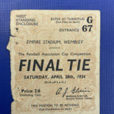 1934 FA Cup Final Football Ticket: 1934 Portsmouth v Manchester City has 4 staple holes where it used to be stapled to programme which is present without covers. C/W 1939 Portsmouth v Wolves has had tape removed from spine which has led to some paper loss to spine and to a couple of pages inside. C/W a good 1952 final apart from staples have rusted away. (4)