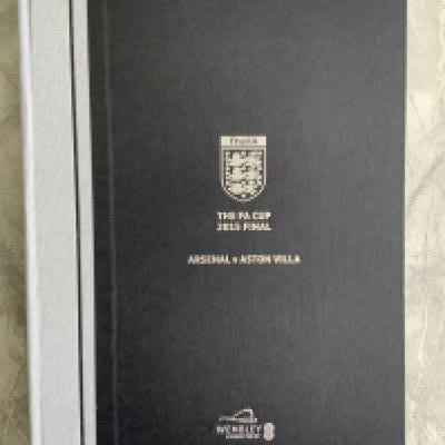 2015 Hardback FA Cup Final Football Programme: Arsenal v Aston Villa Club Wembley ltd edition black embossed programme is in good condition.