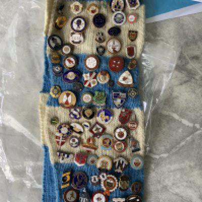 Football Badge Collection: Attached to old football scarf to include mainly old supporters club badges we are told from the 50s and 60s. Most clubs covered with some valuable badges included. Must view. (est 80)
