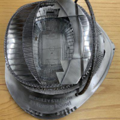 Wembley Stadium Boxed Model: Attractive heavy metal model of the new Wembley made by first team sports. Excellent condition in original box. Removable roof.