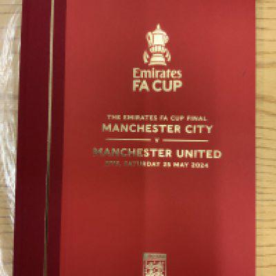 2024 Hardback FA Cup Final Football Programme: Manchester United v Manchester City Ltd edition Club Wembley version number 277 of 3205. Excellent condition bound in red cover with gold embossing.